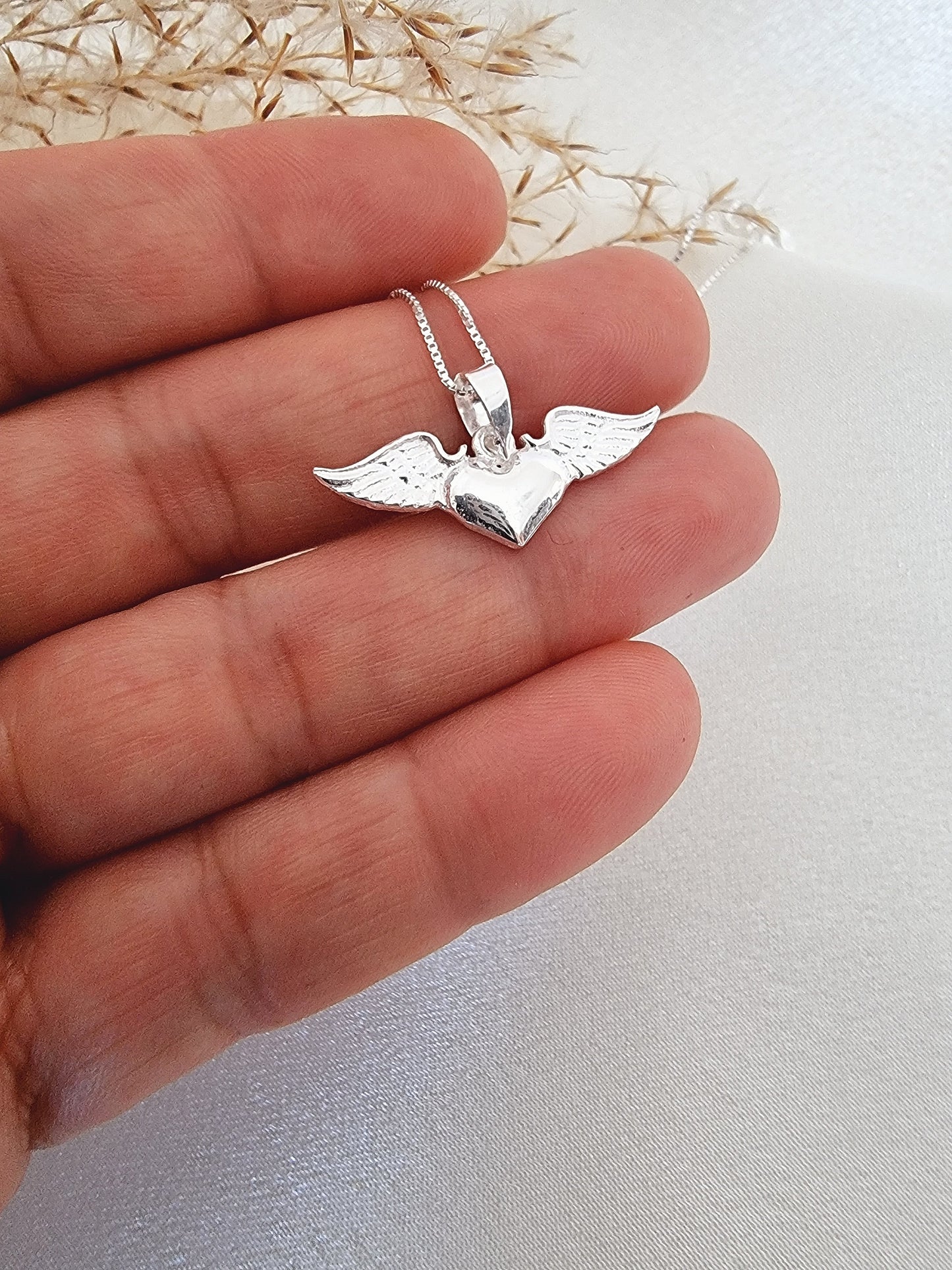 Collar Corazon alado plata 925