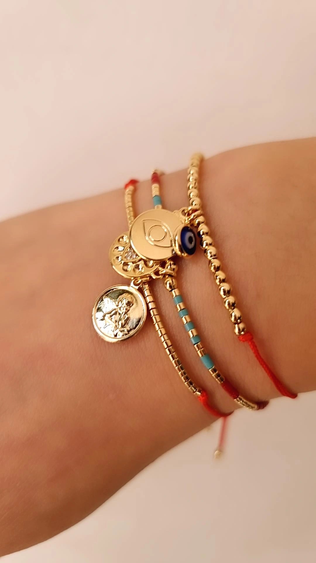 Pulsera hilo rojo protección Angel de la guarda