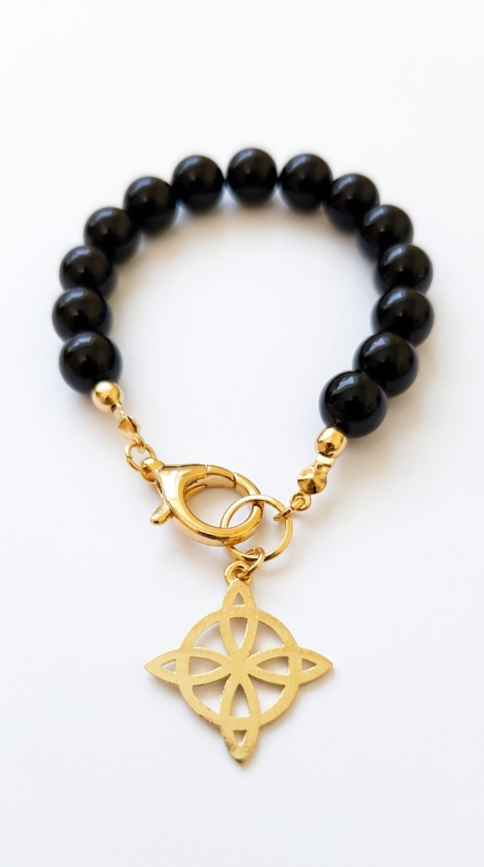 Pulsera onix negro & amuleto de protección