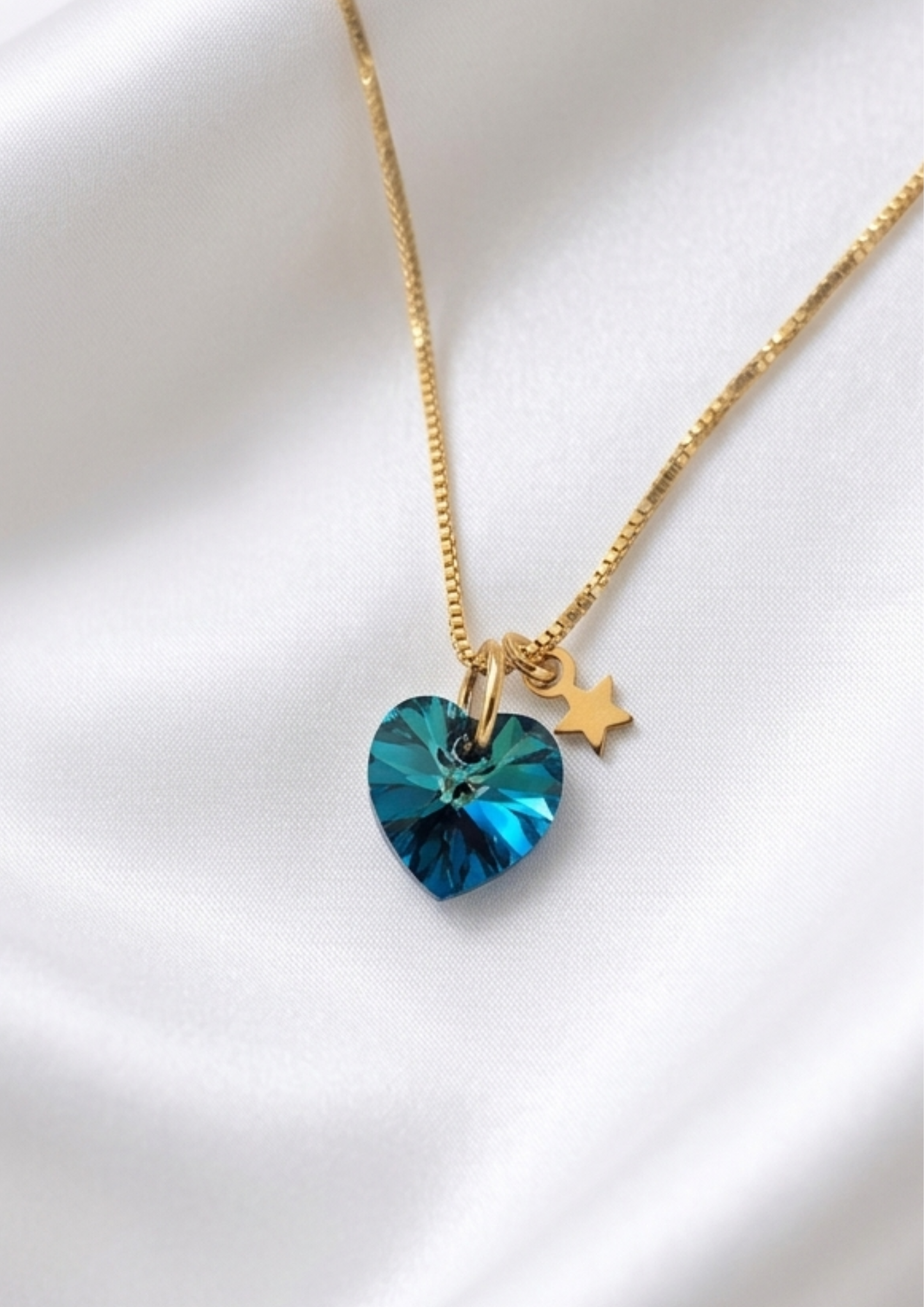 Collar punto luz corazon azul swarovski
